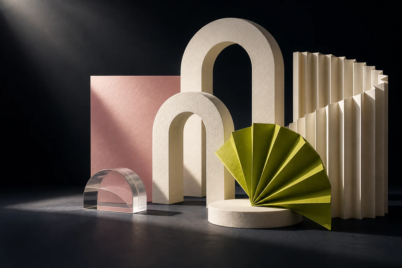 Concept composition of paper arches and folds under studio lighting